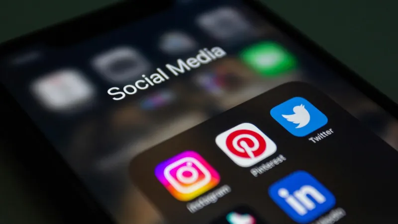 Social platform icons on a phone screen