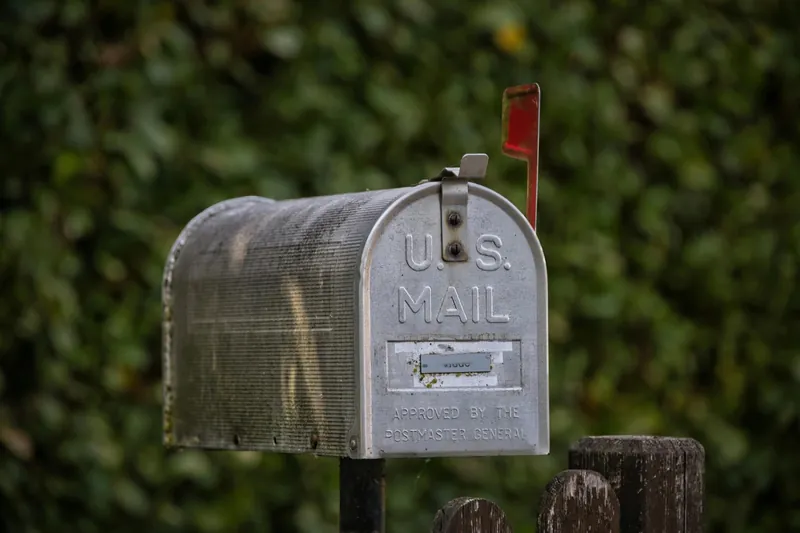 A mailbox with its flag raised