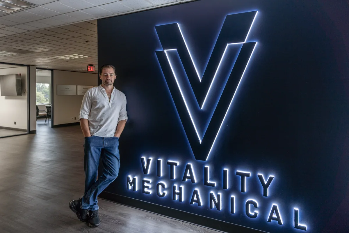 Vitality Mechanical's lit lobby signage